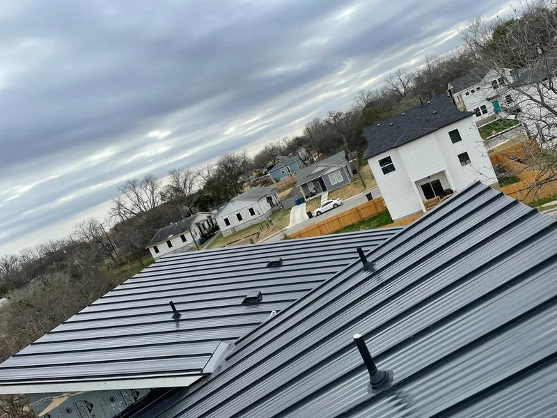Standing seam metal roof panels with vents for Skylight Repair in Irondequoit